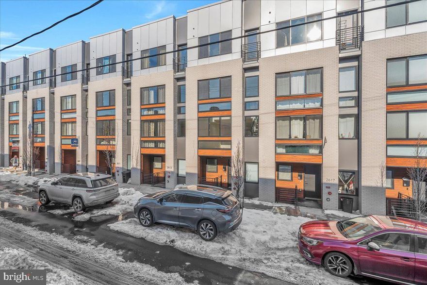 Welcome to 2615 East Boston Street, Unit 2, a sophisticated urban oasis nestled in the heart of the vibrant Fishtown neighborhood. This elegant corner unit offers approximately 2,100 square feet of thoughtfully designed living space, featuring three spacious bedrooms and two and a half spa-like bathrooms. With nine years remaining on the tax abatement, this home delivers exceptional long-term value.

Step inside to discover a meticulously maintained residence filled with abundant natural light from expansive windows, enhanced by custom window treatments throughout. The open-concept living and dining area flows effortlessly into a state-of-the-art kitchen, creating an ideal setting for both everyday living and entertaining.

The home is further elevated by custom pantry and closet build-out as well as a dedicated wardrobe room that could double as a home office. It offers exceptional storage and boutique-style custom organization rarely found in city living. Additional highlights include one-car parking in a secure gated lot directly behind the unit and a spacious roof deck perfect for hosting gatherings while enjoying sweeping skyline views.

Situated a short walk from Fishtown’s most sought-after dining destinations, the popular Aramingo shopping center which offers a Starbucks, Chipotle, HoneyGrow, a grocery store, and more, as well as conveniently located  minutes from the I-95 on-ramp, this home is ideal for those who value both walkability and an easy commute. Experience the perfect blend of modern luxury, thoughtful design, and urban convenience at 2615 East Boston Street.