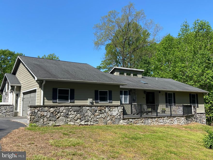 Rare leasing opportunity!  This custom home sits on over 4 acres of privacy where you will be sure to enjoy summertime fun relaxing alongside your inground pool or on one of the multiple patios/decks overlooking trees and nature.  Inside you will find a spacious, open layout featuring a kitchen with stainless appliances and granite countertops, hardwood flooring, stone accents and tall cathedral ceilings.  Just down the hall are three secondary bedrooms, a guest bathroom and the owner's suite. The lower level highlights a theater room and bar area that is perfect for entertaining.  Also, don't miss the 2 car garage and large shed for all of your outside storage needs.  Basement apartment is not part of the lease.  Pets are case by case with a pet deposit of $500.00 and a monthly pet fee of $50.00 per pet.  Short term may be available for more money per month.  Landlord is responsible for pool maintenance.  House can come furnished or unfurnished.