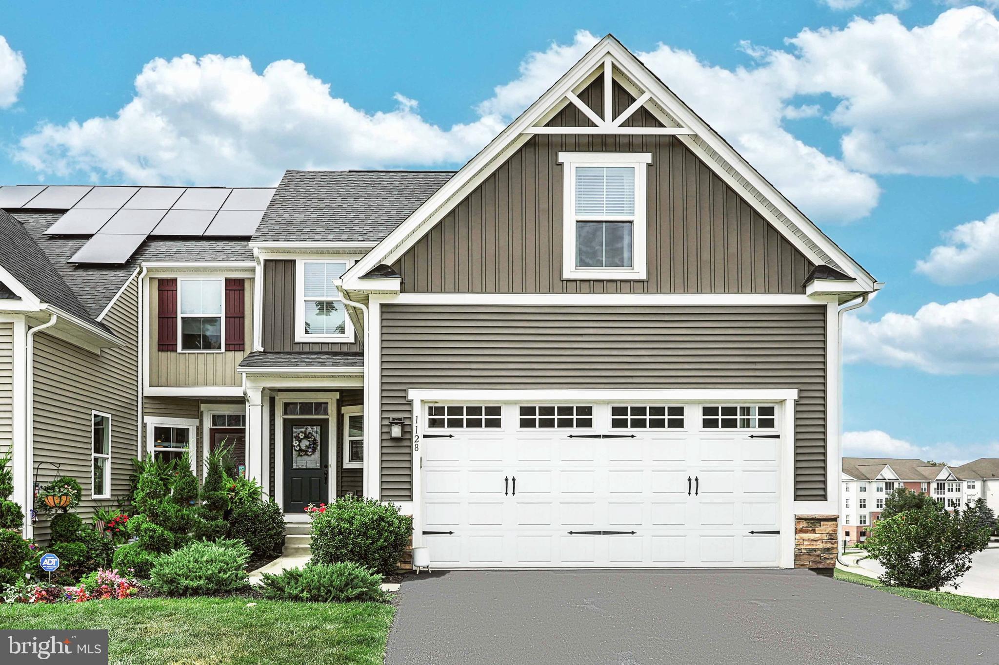 Welcome Home! Look for further than this beautiful end unit condo in a gated community. One owner ownership and move in ready. This seller paid for a premium corner lot which you will see was worth it!
Seller also added an upgraded finishing package. BONUS: This row is the only one where the homes have a walkout basement! As soon as you enter the quaint covered porch into the home you will notice these stunning finishes such as luxury plank flooring, granite countertops, breakfast bar, stainless steel appliances, under cabinet lighting and gorgeous white cabinets. The laundry room and half bath are conveniently located off the kitchen on your way to & from the garage. The open layout with 9" ceilings will make every day living or entertaining have the flow and space everyone appreciates. Off of the living room is a spacious maintenance free deck for relaxing since the lawn is taken care of. From the deck you can see just some of the amenities that make this neighborhood a favorite whether it is the beautifully maintained grounds, close by walking trails or amenities that you can choose to join. The 1st floor owner's suite with tray ceilings is light & airy and the primary bathroom and walk in closet will not disappoint! The lower level is finished for you and ready to be used as you wish. There is a huge storage room with extra features such as tankless hot water heater, passive radon system, whole house humidifier. You will now see how nice it is to have one of the few homes with a walkout basement when the sunlight allows this space to feel less like a basement not to mention the outside enjoyment of the shade from the deck above. This neighborhood is privately nestled close to the rail trail, conveniences, public and private schools, York college, medical facilities, shopping and dining. It is also a great location for commuters going various directions. It is safe to say this home has it all & now all you need are the keys!