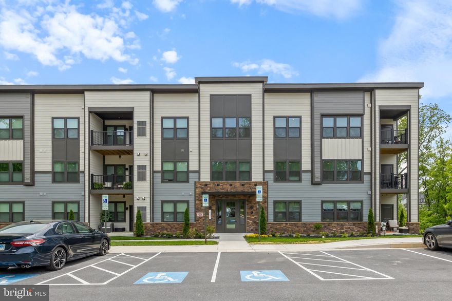 This top-floor luxury residence  tucked away at the end of a quiet cul-de-sac is practically new and waiting for you!
 The bright, open layout feels wonderfully spacious with elevated views and a peaceful wooded backdrop that creates a serene living environment.
Located in the sought-after Turf Valley Golf community,  experience convenience without sacrificing privacy. Grab dinner or do some shopping without getting in your car - restaurants and shops are conveniently  within the community.    The kitchen is a real highlight with stainless appliances, gas cooking, and an island big enough for all your entertaining needs. Step through to the living room and onto your private balcony where you can enjoy your morning coffee while looking out at the trees.
Practical perks include a full-size washer and dryer right in the unit, generous walk-in closet space, ample parking right in front of the building, and an elevator for easy access to your top-floor retreat, and secure entry building. The entire unit is in like-new, barely lived-in condition.    Plus, you're close to Routes 70, 40, 29, and 695, with excellent schools nearby.
This is the perfect blend of comfort, convenience, and tranquility in one of the area's most desirable locations!