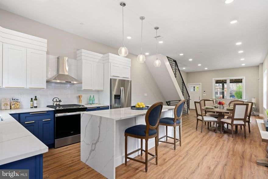 Welcome to 5025 McKean Ave, a sunny semi-detached home situated on a tree-lined street in historic Germantown. Featuring 4 bedrooms, 2 baths, with the lot spanning street to street offering an abundance of grassy yard space and over- sized 2 car garage. As you step into the fully fenced property, notice the lovely front porch with trex decking. Inside, the first floor welcomes you with an open floor plan flooded with natural light. The chef's eat-in kitchen boasts contemporary quartz countertops, 42” white shaker cabinetry, stylish blue accent lower cabinets, stainless steel appliances including an over-range hood, all complemented by gold brushed hardware. Exiting the kitchen you will find the backyard with plenty of space for entertaining, play space for furry friends and family alike, with access to your oversized 2 car garage. Ascending to the second level, you will find 2 guest bedrooms, full bathroom with tub, and convenient side-by-side laundry room. The third floor hosts your primary suite, with custom mill work, a custom walk-in closet, and en-suite bathroom with dual vanity and walk in-shower. Floor is complete with bonus/ flex area with built-in wet bar which is ideal for morning coffee or evening cocktails from your roof top deck. Complete with wine fridge, white/ blue shaker cabinets and quartz countertops. Enjoy your TPO rooftop deck finished with trex decking and sweeping 360º and sunset views. The lower level offers versatility, serving as a perfect 4th bedroom, gym, or additional storage space. This property comes with a FULL 10-year tax abatement, a 1-year builder’s warranty. Surrounded by historic charm, this home is conveniently located steps from Germantown Cricket Club, Germantown Friends School, and Attic Brewing Company.
Easy access to public transportation and easy commute to Center City and Suburbs.