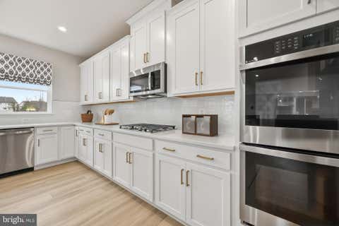 Photo of 10428 Halmstad Drive, WALDORF, MD 20603 (MLS # MDCH2058584)