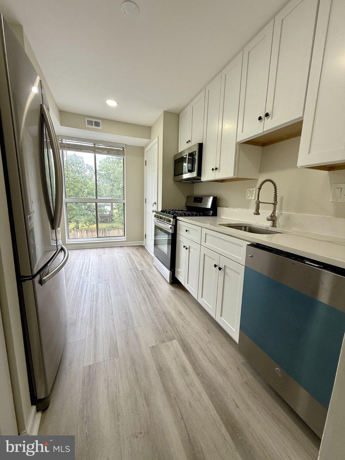 5608 BLOOMFIELD DRIVE 201