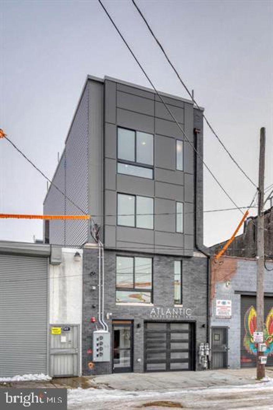 Incredible opportunity to own this newer construction property in South Kensington, one of the most rapidly developing neighborhoods in the City.  There is development and growth in every direction of this amazing property.    The incredible and most unique aspect is Unit 1 - the  Commercial space (currently being used Live / Work artist studio apartment).  And then in addition there  are  two residential apartment brining in substantial income, both with their own private roofdecks !    Further, there is a tax abatement until January 2030 which helps with cash-flow either as an investor or an owner occupant !   This property will not disappoint! Unit 1 is a spacious commercial space with 2 full baths, washer, dryer, deck, basement and PARKING. Unit 2 is an amazing 2 bedroom, 2 bath unit with generous living space, a luxurious kitchen, laundry, huge deck, wet bar and a grand bedroom suite. Unit 3 is a beautiful 2 bedroom, 2 bath unit. Convenient location, very close to the Berks El Stop, coffee shops, and popular restaurants/bars.