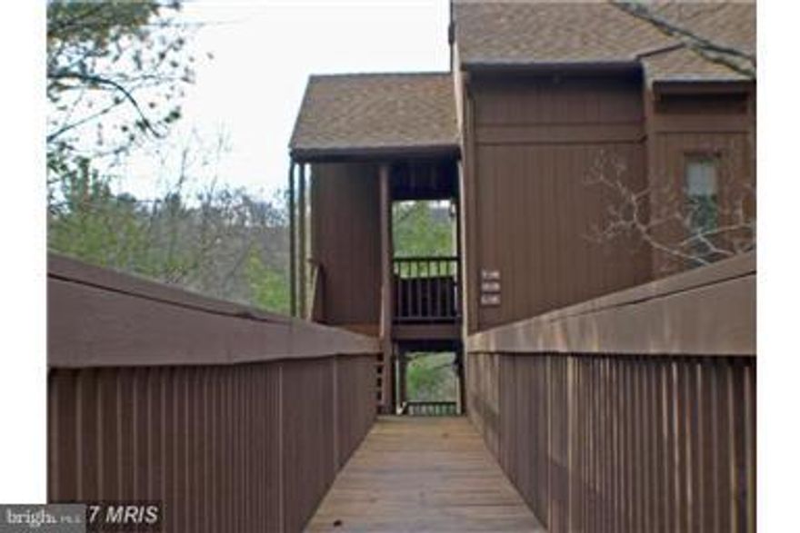 LARGE, END UNIT BRYCE HILL CONDO with a large deck, 3 bedrooms (including the huge loft) 3 baths and a main level washer and dryer. New kitchen appliances, comfortably furnished and lots of natural light! Enjoy the wood burning fireplace and watch the mountains from the deck. Treed and mountain views, water, firewood, trash pick up and more included. Priced to sell and ready to move in!