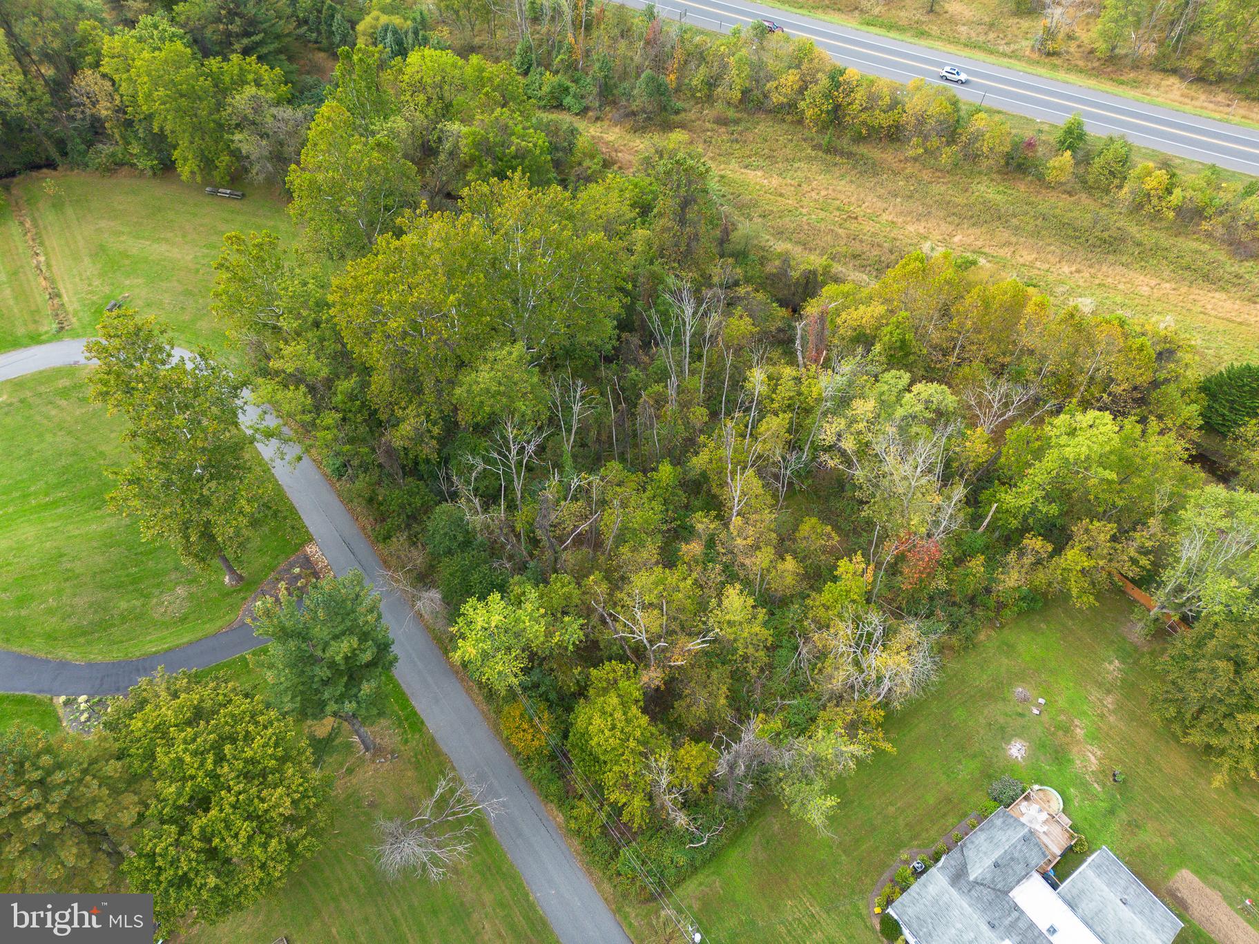 Great location in a desirable neighborhood and school district as well as centrally located in Bel Air, the Heart of Harford! (**All info provided is for informational purposes only and not a final determination as to whether the property is actually buildable. Buyer is responsible for their own due diligence in verifying that the property is or is not buildable.**) Lots 52 and 53 are deeded and being sold together. Both lots together total just less than an acre. Property has never been built on and is heavily wooded. Ability to build is highly questionable. Public water and sewer is in the neighborhood but unsure exactly how far it extends and how much it would cost. No perc records available, what documents were on file with the Health Dept are attached. Property is in the 100yr floodplain. Sold as-is, buyer responsible for their own due diligence.