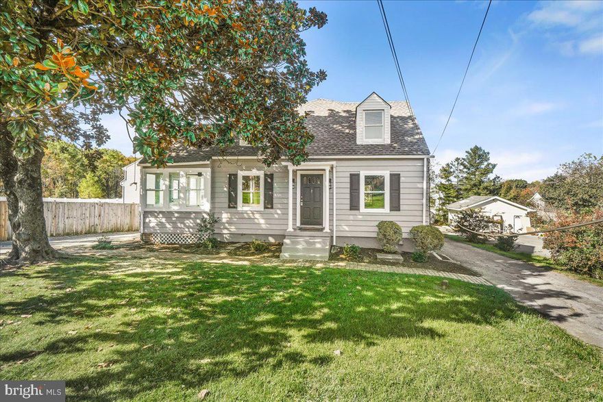 **Don't forget to check out the stunning video tour of this property!** Welcome to this charming and surprisingly spacious home, offering much more than meets the eye! Upon entering the foyer, you'll find a welcoming layout with the dining room on one side and the family room on the other. The family room offers a warm and inviting ambiance, highlighted by a wood-burning fireplace surrounded by stone. Take advantage of the built-in shelving to showcase your favorite books, seasonal decorations, or travel keepsakes. Adjacent to the family room is a sun-filled three-season room with built-in heater, durable tile floors and access to the outdoors—an adaptable space perfect for enjoying throughout the year.

Beautiful hardwood floors extend through the main level, leading to a bedroom that doubles as a home office, complete with its own private balcony. A modern half bath on this floor offers added convenience when entertaining.

The kitchen is adorned with cream-colored cabinets, sleek granite countertops in cool tones, stainless steel appliances, and plenty of storage space. It also includes a brand-new refrigerator and is connected to a dedicated dining room that features built-in shelving for displaying your cherished serving pieces or collectibles.

Upstairs, you’ll discover four spacious bedrooms, each with hardwood flooring and generous closet space. One bedroom boasts an ensuite bathroom for added privacy, while the remaining bedrooms share a  recently updated hall bath.

The finished lower level is both functional and private, with its own entrance or access from inside the house. Ideal for multigenerational living or those household members needing extra space, this level includes a kitchenette with a full-sized refrigerator, additional living and recreational areas, a laundry room with washer/dryer, an additional washer/dryer area, a bedroom, a full bath, and a naturally lit den or office. With eight ductless mini-split systems, you’ll enjoy comfort throughout the home. 

This home offers even more with all new light fixtures, new outlets, fresh paint, served by public water and sewer, newly updated bathrooms, all-new windows, recently renovated kitchen, a water management system connected to a sump pump, and plentiful parking with a driveway that loops around the property for added ease. The detached garage features a shed attached at the back, providing plenty of additional storage space. 

The backyard is a peaceful haven, ideal for pets, play, or relaxation, complete with a grassy area and a fruit-bearing apple tree. Enjoy easy access to major highways like I-270 and I-70, close to Rt. 124 and Rt. 108,  nearby shopping, parks and dining.  Conveniently commutable to Mount Airy, Clarksburg, Gaithersburg, Rockville, Olney, and Frederick.