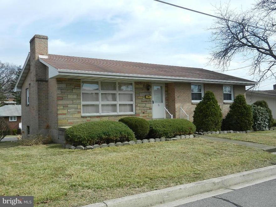 Great location near schools and shopping, this brick & stone residence is available for immediate occupancy for well qualified buyer.  Features include: large living room with wood burning  fireplace, family size kitchen with dining area, three bedrooms, 1.5 baths, oak flooring on main level, full basement, family room, laundry room, shop area and one car garage.  Call to see today!