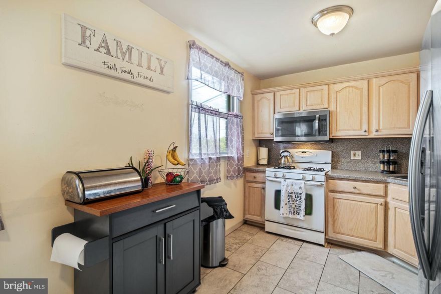 CHECK OUT THE VIRTUAL TOUR LINK https://my.matterport.com/show/?m=8qySNFiZTms  and https://www.dropbox.com/s/o99y593ja64zuum/Daniel%20Evenchen%20-%203257%20Comly%20Place.mp4?dl=0 for this beautifully maintained home in a great cul-de-sac street in the northeast section of Philadelphia. This 2-story home has been meticulously cared for over the years and features 1-CAR PARKING. It all starts as you enter the home into a tile vestibule, up a few stairs you enter your spacious and sun-drenched living room with hardwood floors. The living room has an open floor plan that flows into a large dining room. From the dining room, you enter into the bright eat-in kitchen with stainless steel refrigerator, gas stove, and built-in stainless steel microwave. Back through the dining room to the entrance to the finished basement as well as a powder room that is conveniently tucked away. Downstairs in the basement you will find full size washer and dryer, access to an old garage that has been converted into storage space (that can easily be converted back in to a garage), and a large den that can be used as a guest bedroom. From the den, you have access to your large private back patio. Upstairs you will find the hardwood floors continued throughout. There are 3 bedrooms, a full bathroom with a tub and skylight and an updated vanity and powder room. All square footage numbers are approximate and should be verified by the buyer. This home is near I-95 and Franklin Mills Mall and many more attractions! It is the responsibility of the buyer to verify real estate taxes.