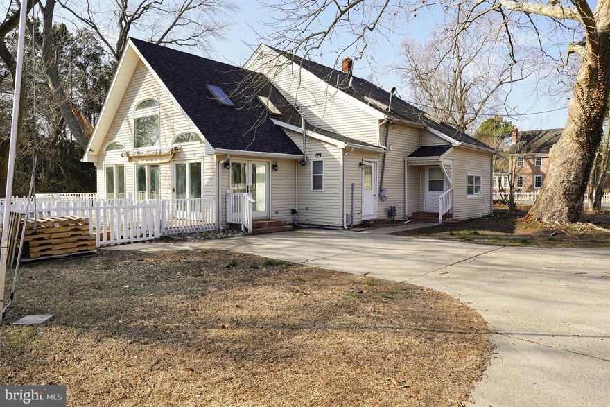 Unique opportunity - Updated and incredibly spacious 3,110+sf, 3-4 bedroom + large bonus room + loft / study room, 3 full baths. This contemporary home on almost an acre on Salisbury's East-side boasts tons of flexible living spaces and room for everyone! What a transformation - this property has been brought back to life - Brand new roof, new septic being installed, new flooring, new paint, huge new deck, new fixtures, new ceiling fans, new kitchen appliances and granite counter, new bathrooms - so much more! 1st floor welcomes you in through a seamlessly flowing floorplan - perfect for entertaining, while reserving intimate spaces. The front living room offers a great space for more quiet enjoyment - catching up on TV, reading, home office / computer room. Family room opens into the dining room, which opens into the huge 2-story great room off the kitchen. The kitchen has been opened up to create a more airy feel, and create comfortable gathering spaces at the new breakfast bar - new high-end granite, new stainless steel appliances, and fixtures - loads of cabinetry and counter-top workspace. 3 sets of double-doors, abundance of windows, and skylights really bring the outdoors in - so much warm sunlight. 1st-floor Primary bedroom with walk-in closet, full, en-suite bath - new tub/shower, new double-sink vanity - and 2 sets of double doors lead out to the oversized deck. Formerly a home office, the second 1st-floor bedroom has a separate entrance to the outdoors. Full bath with new tub/shower combo and new vanity, utility room complete the first floor. Upstairs floorplan is just as incredible - nice-sized loft area, 2 bedrooms, and a massive flex/bonus room filled with light - from the ample windows on 3 sides. This bonus room is large enough to be multi-functional - game room, exercise/yoga/art studio - so much potential! Small attic on the 3rd floor. Outside - soak up the warmer weather on this incredible new porch. Additional storage in the detached 2-car garage. This home is truly a must-see to experience! Sizes, taxes approximate.