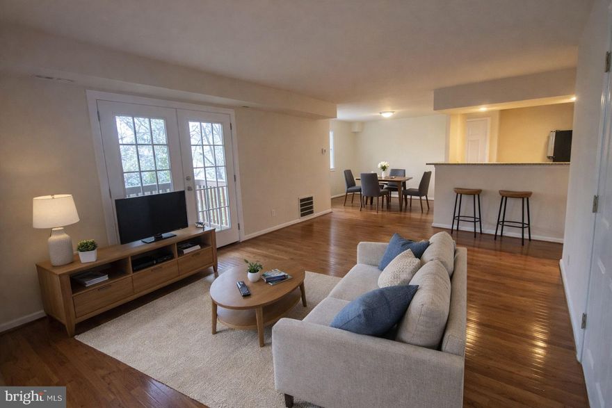 Step into 896 sq. ft. of bright, modern comfort in this beautifully updated 2BR/1BA condo. Spacious living room, hardwood floors, soft-carpeted bedrooms, central AC, in-unit washer/dryer, and sleek gas appliances. The balcony leads to a relaxing green view and both bedrooms has generous closets. This condo truly understands how to unwinding after work and enjoy affordable convenience.

Located in one of the quietest corners of the community, this home offers unbeatable access to major commuter routes. 

The Association is financially strong and offers some of the LOWEST condo dues in Prince George’s County — a huge win for monthly affordability. This project now meets conventional Fannie Mae and FHA financing requirements, making this an ideal opportunity for first-time buyers. Seller is including a 3-year Home Warranty and is open to helping with closing costs.

Please be aware that offers will only be considered by prospective buyers who intend to live in the unit.