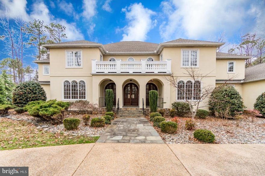 Stunning Mediterranean Style Home Nestled up against the 11th Hole of the Arnold Palmer Championship Golf Course on 1 Acre Corner Lot! Gorgeous 6 Bedroom, 6.5 Baths, 6000+ Finished Living Space. Soaring Two Story Foyer, Marble Floors, Coffered Ceiling and Curved Staircase. Formal Living room and Dining room with Crown Molding and Palladium Windows, Gourmet Kitchen, Granite Counters, Large Island with Sink, Warming Drawer, Lots of Cabinets with Lighting Underneath and Beautiful Tile Flooring. Main Level Master Suite with Fireplace, His & Hers Walk-in Closets with Lots of Shelves and Built-in Dressers, Luxury Bathroom with Granite, Jetted Tub and Separate Walk-in Shower with Glass Doors. Office/Den, Beautiful Slate Patio and Balconies. Landscaped Grounds with Mature Trees Surrounding Home. Private Beach, Tot Lot/Playground, Walking Trails and 18 Hole Golf Course for Your Enjoyment! Sold As-Is