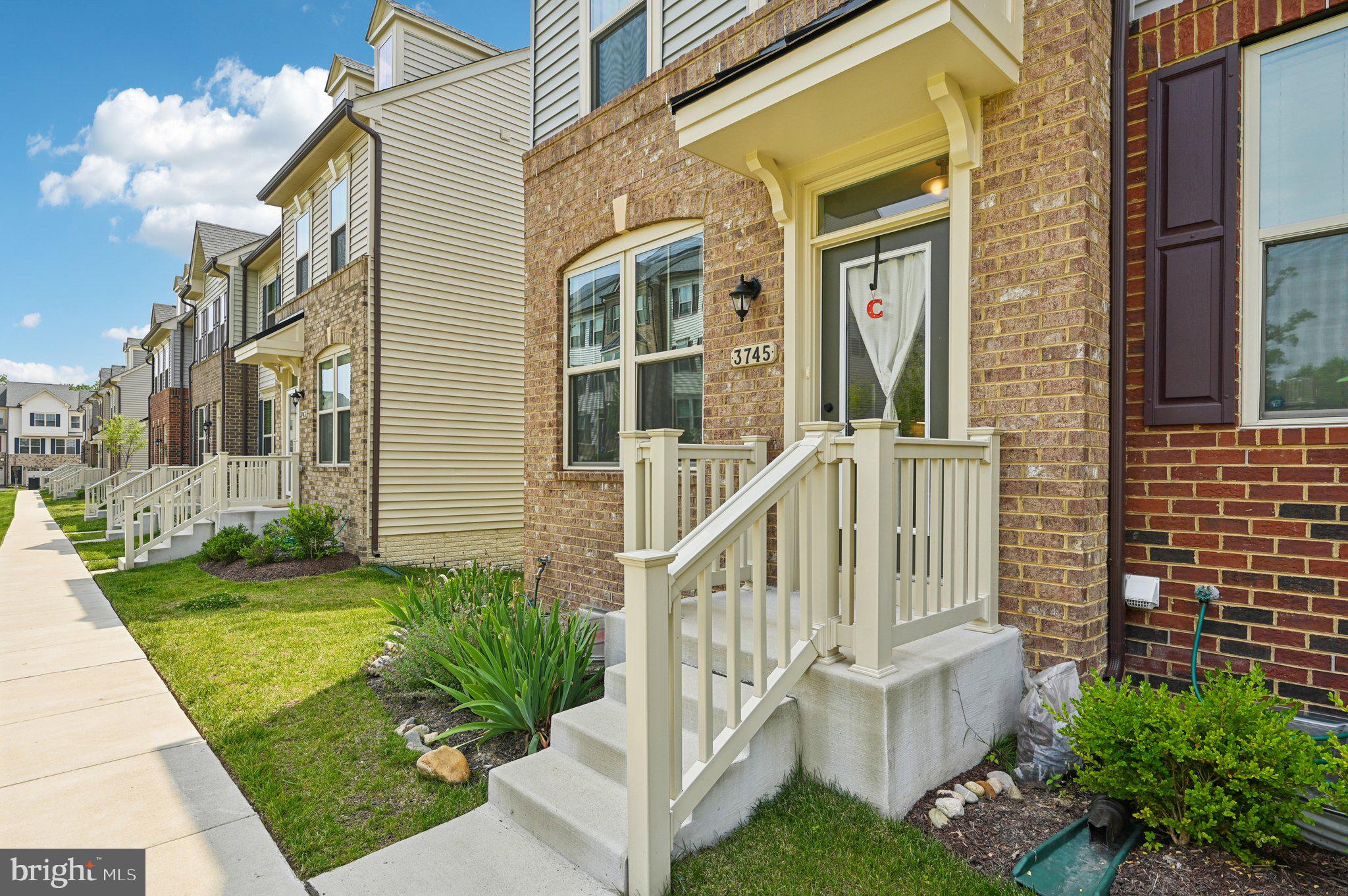 This beautifully designed end-unit townhome offers the perfect blend of style, comfort, and versatility. As one of Ryan’s most sought-after models, the Clarendon, this home features a thoughtfully crafted layout ideal for both everyday living and entertaining. Step inside where the living room is filled with natural light from multiple windows and seamlessly connects to the kitchen—creating a warm and unified living space. Both an L-shaped marble countertop plus a center island offer more functional cooking space, and just off the kitchen the dining area provides the perfect spot for entertaining guests or enjoying everyday meals. Sliding glass doors lead to an upgraded composite deck, extending the living space outdoors. There's also a convenient half bath on this level. The stairwell is upgraded to wood. Upstairs, the owner's suite is a true upgraded retreat, boasting a large walk-in closet, dual vanity, and tiled shower with bench seat. The second bedroom also offers a private en-suite layout with tub/shower combination. The fully finished lower level adds even more living space with a third bedroom and a full bath featuring both a shower and tub—perfect for a guest suite or home office, and also features an optional welcome station with hooks and bench seating just off the garage along with extra storage space offered by two walk-in closets. Front door entrance steps are ergonomically convenient. A one-car, rear entry garage offers secure parking and added peace of mind. With its premium end-unit location, abundant natural light, and wide range of custom upgrades, this townhome truly stands out. Enjoy all of the amenities the Parkside community has to offer, including a clubhouse with well-equipped fitness center, meeting/party room, walking trails, resort style outdoor pool, dog walking stations, and tot lots and playgrounds. The location was thoughtfully chosen and provides easy commuting to DC, Baltimore and Annapolis, plus it's right next door to the Odenton stop for easy commuting, Ft. Meade and NSA, minutes from I-295, Rt. 175, and Rt. 32, along with all of your shopping needs. Come on over to check out your future new home!