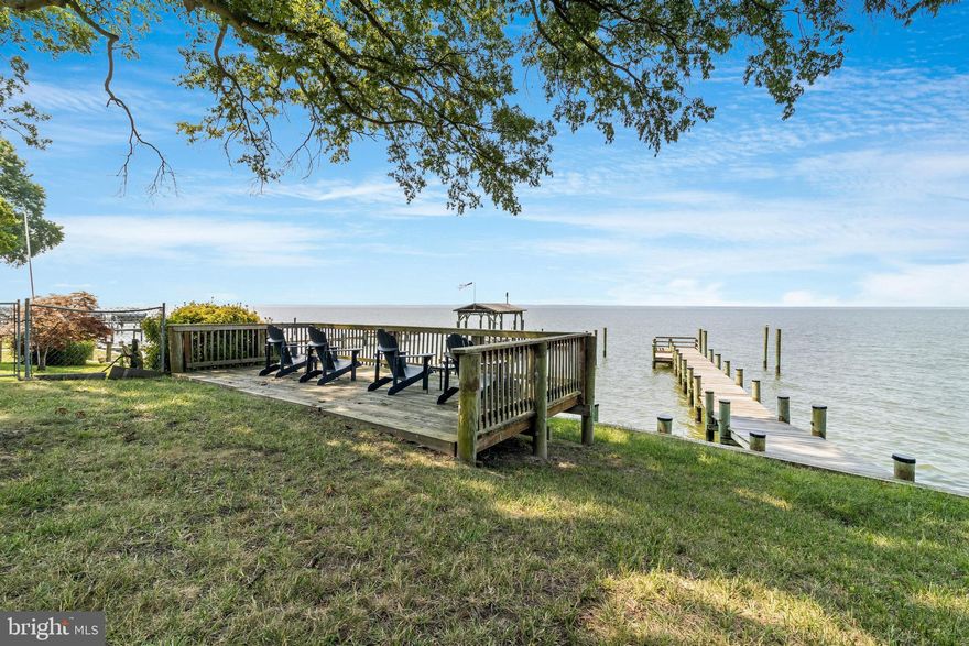 Adorable Cobb Island cottage with amazing waterfront views. This 2 bedrooms, 1 bathroom home will take you back in time with the original  hardwood floors, window awnings, and real wood paneling. The home has been well maintained and a few updates have been done over the years. Pier and deck were updated in 2015, the perfect place to watch the sunset, get a tan, or relax and enjoy the view.