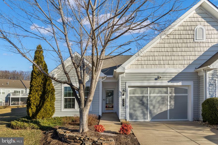 Welcome to 132 Hyannis Place—an impeccably maintained home in one of Stafford's 55+ communities, offering resort-style living with indoor and outdoor pools, a vibrant community center, pickleball and tennis courts, and fitness center. This thoughtfully updated residence features hardwood flooring on the main level, newer carpeted stair runner, LVP in the mechanical room, and a long list of smart and functional upgrades including a Nest thermostat, Ring doorbell, and updated stove/microwave wall combo. The home has been consistently cared for with, refreshed exterior paint at the front and garage, updated bathroom mirrors, and improved drainage and gutter systems. Garage storage racks add practicality, completing this move-in-ready package. Enjoy low-maintenance living, outstanding amenities, and a home that shows true pride of ownership—schedule your tour today!