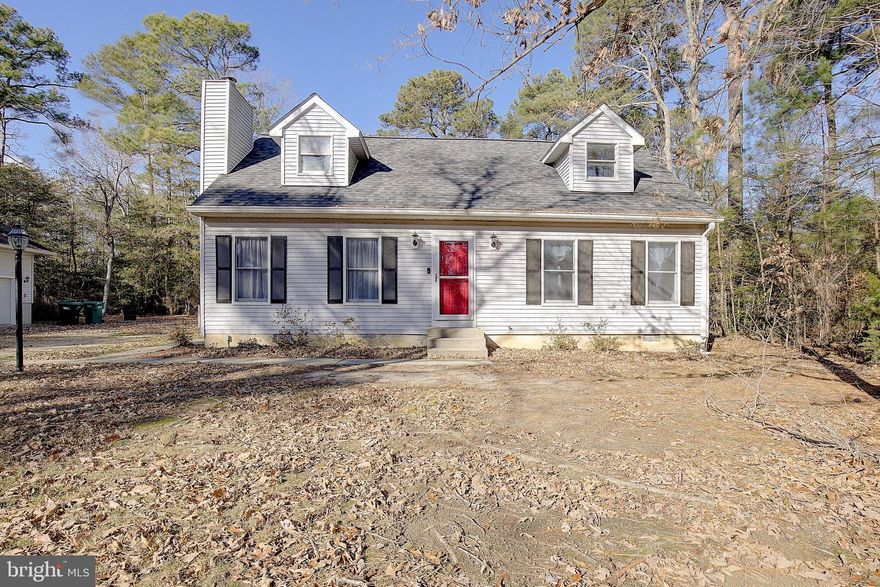 Wonderful  opportunity within a serene country setting. This 3-4 BR 1600 square foot cape cod includes a detached garage/workshop. Home features a high efficiency fireplace, new LVP flooring and carpet in BRs on main level and custom wood flooring on upper level, which could have 4th BR (or home office). New Roof Installed summer of 2025. 3 Car Garage is set up for separate expansive large workshop area, or convert into office space (or a Rec Room!) and is insulated, has large attic. Deck, sheds, fenced back yard. Great space close to various military installations within Southern Maryland