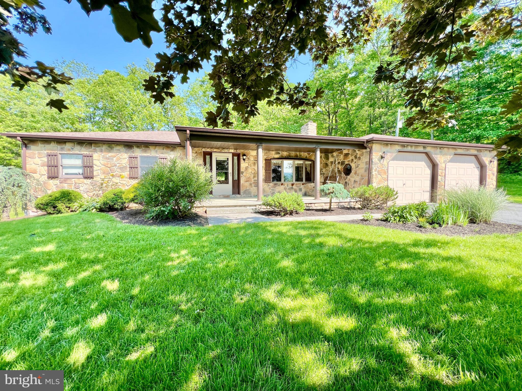 his secluded ranch home offers a perfect retreat nestled on approximately 6+/- acres bordering Pennsylvania State Game Lands. The main floor features a welcoming living room, dining area, kitchen, three bedrooms, two bathrooms, bonus room, and convenient laundry hookups. The partially finished basement includes two additional bedrooms and ample storage space, making it ideal for family or guest accommodations. Outside, you'll enjoy a covered front porch with breathtaking views of the scenic countryside, a rear patio perfect for relaxing or entertaining, and a tranquil fish pond. The property also boasts multiple outbuildings, a pavilion, a fenced pasture with a small horse barn, and a mountain stream, providing abundant opportunities for outdoor activities and hobbies.