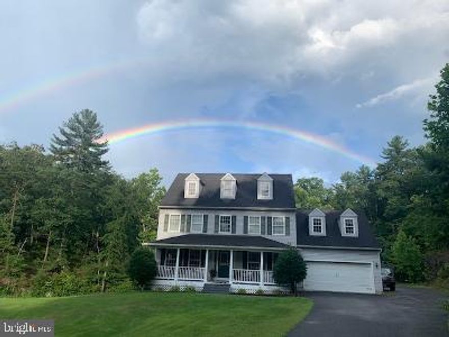 Your little piece of heaven awaits! 5 acres of privacy with your own pond and wooded lot.  Deck and porch to sit on and watch the wildlife.  House features 4 bedrooms and 3.5 bathrooms, fully finished Attic, finished basement and Bonus room over the garage.  2 gas fireplaces and 2 zone heating system.  Hardwood floors throughout main level.  Oversized detached 4 car garage with electricity for the car enthusiast.  As well as a large metal out building. Priced to sell!