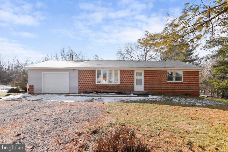 Welcome to your charming, fully renovated two story brick Rancher sitting on half an acre in country quiet living of Hagerstown! You will fall in love with the private neighborhood and peaceful views. This home offers 4 bedrooms, 2 full baths on two levels with an eat-in kitchen and spacious living room. The open concept kitchen has gorgeous white quartz countertops with gold accents and a luxurious waterfall island, brand new cabinets and stainless-steel appliances. Luxury vinyl plank flooring throughout upper level. New ceramic tiles in kitchen and bathrooms.  On the upper level you will find the master bedroom with attached master bath featuring a double sink vanity and closet. The lower level consists of a junior suite with a full bathroom.  Brand NEW roof! Brand NEW septic system! All new lights, fixtures, electrical and plumbing systems. 1 car attached garage. Brand new doors and windows. Beautiful new large deck with stairs for easy access, perfect for BBQ. Enjoy the backyard hosting family and friends. Prime location in a secluded area close to Meritus hospital, shopping, restaurants, schools and Ymca! Offer Deadline, please submit your best and highest offer by Monday January 22 at 3 pm!