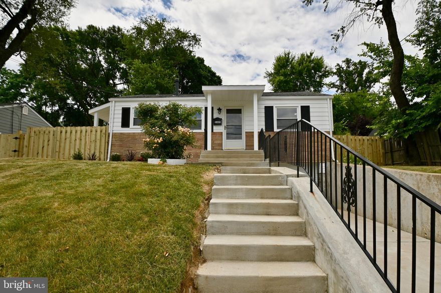 This beautifully FULLY REMODELED 3 bedroom 2 full bath home with garage features a BRAND NEW GOURMET kitchen and 2 BRAND NEW baths!! Designer tile, decorator touches, quartz counters and high end stainless appliances are just a few of the FABULOUS features this home offers!! Large fenced lot!!  Conveniently located close to the Beltway and near Huntington Metro Station!!