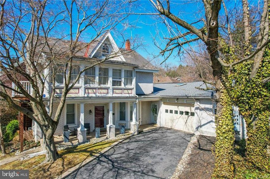 A Fusion of Historic Charm & Modern Living nestled in the heart of College Hill, this distinctive 4,000SFT property blends historical elegance w/ contemporary design. Originally built in 1875, the main house seamlessly connects to a historic blacksmith shop, offering approx. 2,700SFT of space. This rare gem offers the flexibility of either a spacious single-family home or a multi-generational residence. The main living space is a stunning open-concept design featuring soaring vaulted ceilings, exposed wooden trusses, & large skylights that flood the home with natural light. Antique brick walls & original architectural details accentuate the space, creating a perfect harmony between old-world charm & modern updates. The gourmet kitchen w/ sleek granite counters, custom cabinetry, & high-end appliances. The main bedroom is a luxurious retreat w/ a vaulted ceiling, exposed beams, and a striking brick wall of historical character. 3 additional bedrooms make up the main home. The spacious main bath features a jetted tub, large marble-tiled shower, & finishes that make it a perfect spa-like experience. The 2nd/3rd floors house a fully approved apartment with a long term tenant. This unique property is full of possibilities, whether you're an owner-occupant looking for extra rental income, a multi-generational family, or someone seeking a home that blends the best of both worlds. Property is zoned for a 2 unit consisting of the main home w/ extended space, & a upstairs apartment.