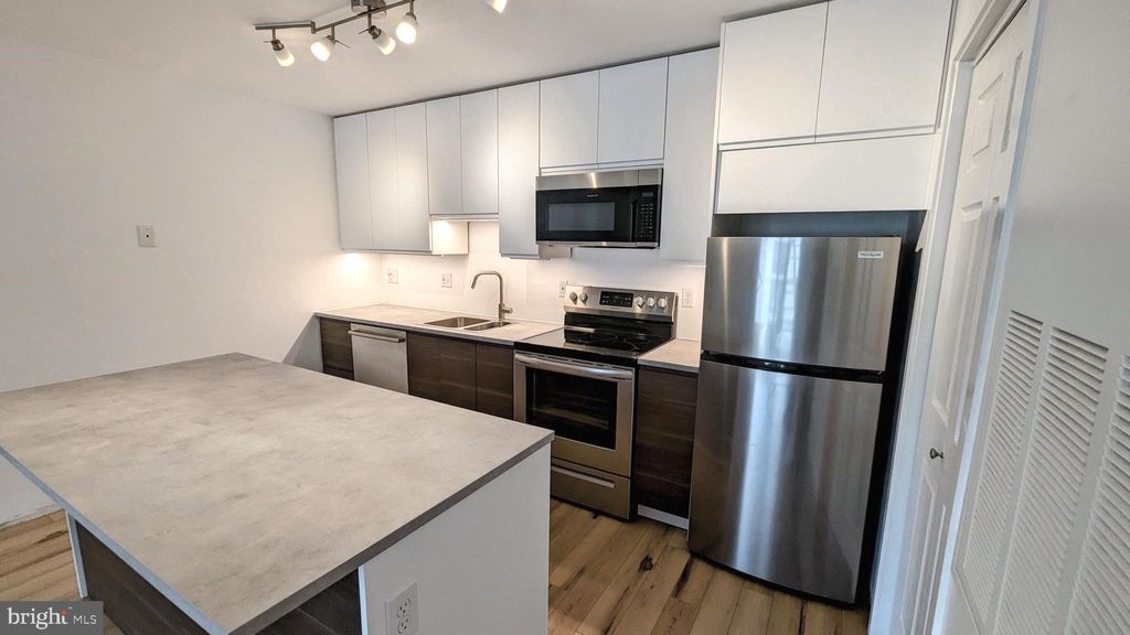 Photo of 3310 Wyndham Circle W #314, ALEXANDRIA, VA 22302 (MLS # VAAX2051444)