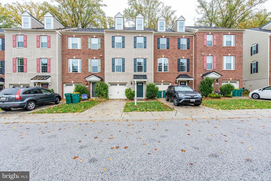 3 Level townhome located in Ellicott Crossing with spacious living room, gleaming hardwoods in the open dining room and kitchen. Kitchen is the perfect social hub when entertaining. The chef's kitchen hosts a breakfast bar and island, granite counters, stainless steel appliances, backsplash, french door access to the low maintenance Trex deck overlooking trees. Primary suite includes a walk-in closet, a lighted ceiling fan, and a private bath with a dual sink vanity, a separate shower, and a soaking tub. Adding to the fun, the entry lower level is a completed family room with recessed lighting, walk out to rear yard. Fridge and dishwasher replaced 2022.