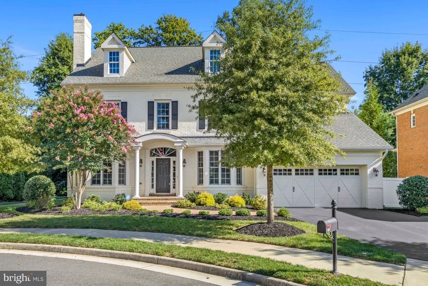 A stunning dream home with premium location in the heart of Vienna on a private, treed cul-de-sac lot. This impeccable, all brick home boasts exquisite details around each and every turn including hardwood floors throughout much of the home; elegant moldings; two gas fireplaces; a main level Home Office; gourmet Kitchen with huge entertaining island, granite counters, stainless steel appliances, gas cooking, abundant cabinet and pantry space; bright and open Family Room with detailed coffered ceiling and a cozy gas fireplace - perfect for the upcoming Fall evenings; your entertaining and living spaces seamlessly flow from the Kitchen and Family Room to the outdoors where you can find peaceful retreat after a long day, or visit with guests, on the slate patio and fenced backyard backing to trees; luxurious Owner's Suite on the upper level with a Sitting Room, two walk-in-closets, lavish Bath with a stand alone soaking tub, walk-in spa shower, and dual vanities; three additional Bedrooms and two Bathrooms area also located on the upper level; Laundry and Sorting Room conveniently located on the bedroom level of the home; expansive lower level was finished just two years ago and hosts an expansive Rec Room and Game Room complete with built-ins to host your entertainment system, a magnificent wet-bar, a Home-Gym, a fifth Bedroom, and a full Bathroom. A location like no other... hop on the W&OD trail right off the cul-de-sac; less than a 5 minute walk to Tysons Woods Park with playground/walking trail/picnic tables/grilling, short walk to the town of Vienna where you can enjoy local festivals, farmers markets, local shopping; just minutes to Tysons Corner Center, Mosaic District, multiple Metro access points, major commuter routes (66, 495, 50, Dulles Toll Road); a quick drive to downtown DC where you can explore the sights and sounds of our nation's capital. This phenomenal property is ready for you to call it your new home!