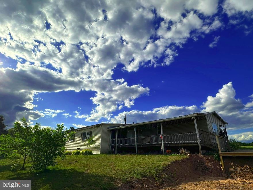 Charming Country Home on 2 Picturesque Acres in Clearville.

Welcome to your peaceful retreat! This single-wide ranch home is situated on 2 scenic country acres in Clearville, PA, offering the ideal blend of comfort, space, and rural charm.

Inside the home you'll find 4 bedrooms, an open concept kitchen and dining area, cozy living room, plus room for office/gym space. Two full bathrooms, one featuring a 11x5 walk in closet.

Step outside and enjoy the open landscape which is perfect for gardening, outdoor entertaining, or simply soaking in the tranquility and stunning views of your surroundings. The true standout of this property is the large detached outbuilding, complete with three garage bays. This space is ideal for vehicle storage, workshop, or hobby space.

Whether you're looking for a full-time residence, weekend escape, a comfortable space to stay while you build or an investment property with room to grow, this property offers endless potential in a serene setting.