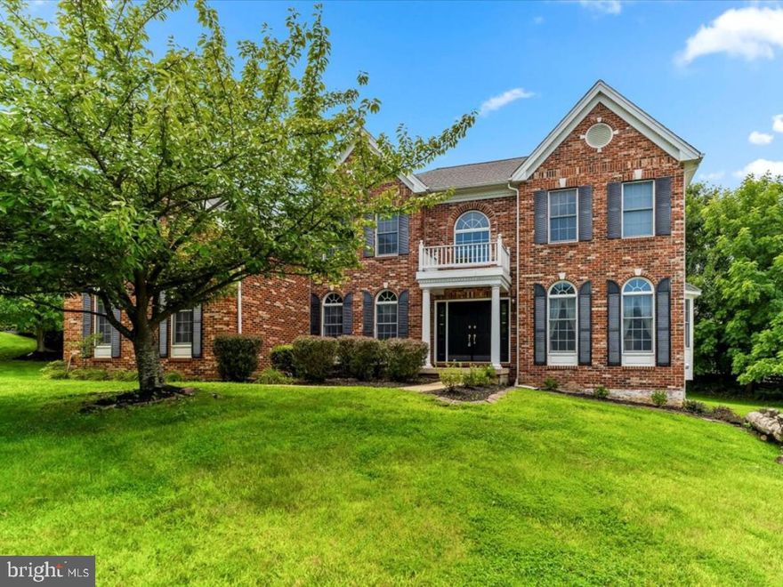 Welcome to 106 Berwick Drive, a breathtaking brick-front home situated in the prestigious Westtown Chase community of West Chester, PA. Nestled on a private cul-de-sac, this stately residence offers an unparalleled retreat within the award-winning Rustin High School boundaries, all while providing easy access to major routes like Rt. 202 and Rt. 926.

Step inside through the grand two-story foyer, where an elegant spiral staircase greets you with timeless sophistication. The formal living room to your right is adorned with double crown molding, exuding charm, while the dining room on your left impresses with its chair rail, rich hardwood floors, and refined finishes, perfect for hosting intimate gatherings.

The heart of this home is the showstopping two-story family room, featuring soaring vaulted ceilings and a striking floor-to-ceiling stacked stone gas fireplace that demands attention. This impressive space seamlessly connects to the expansive eat-in kitchen, a chef’s dream with granite countertops, a tiled backsplash, recessed lighting, a central island, and a separate pantry and desk area. Adjacent to the kitchen is a sun-soaked breakfast room/solarium, where large windows, new skylights, and French doors invite natural light and lead to a spacious  brand new composite deck—an ideal spot for enjoying your morning coffee amidst serene natural surroundings. The kitchen also offers access to a secondary staircase that ascends to the upper level, enhancing the home’s thoughtful design.

The first floor further includes a versatile office, a convenient laundry/mudroom with an oversized coat closet, and easy access from the extra-large three-car garage and a separate back door leading to the deck. A powder room completes this level, blending beauty with functionality.

Upstairs, the master suite is a luxurious sanctuary, featuring ample space for a sitting area, a vast walk-in closet, and a spa-like en-suite bathroom with dual vanities, a soaking tub, and a separate shower. The additional bedrooms are generously proportioned, including a princess suite with a private bath and a Jack-and-Jill bathroom shared by two other bedrooms.

The fully finished walk-out basement is an entertainer’s dream, featuring a home gym area, a 5th bedroom, a beautifully appointed full bathroom, and an impressive wet bar equipped with wine/beverage refrigerators and a designated beer tap area. Whether you’re hosting lively gatherings or setting up a private in-law or guest suite, this versatile space offers endless possibilities. It also includes a spacious open area for entertainment, along with ample storage, featuring wrap-around closet areas.

The private backyard is a tranquil haven, perfect for relaxation or outdoor activities. Located in a sought-after community close to everything West Chester has to offer, this home is a rare opportunity to own a piece of luxury in a prime location. Don’t miss the chance to make 106 Berwick Drive your new home—schedule your private tour today!