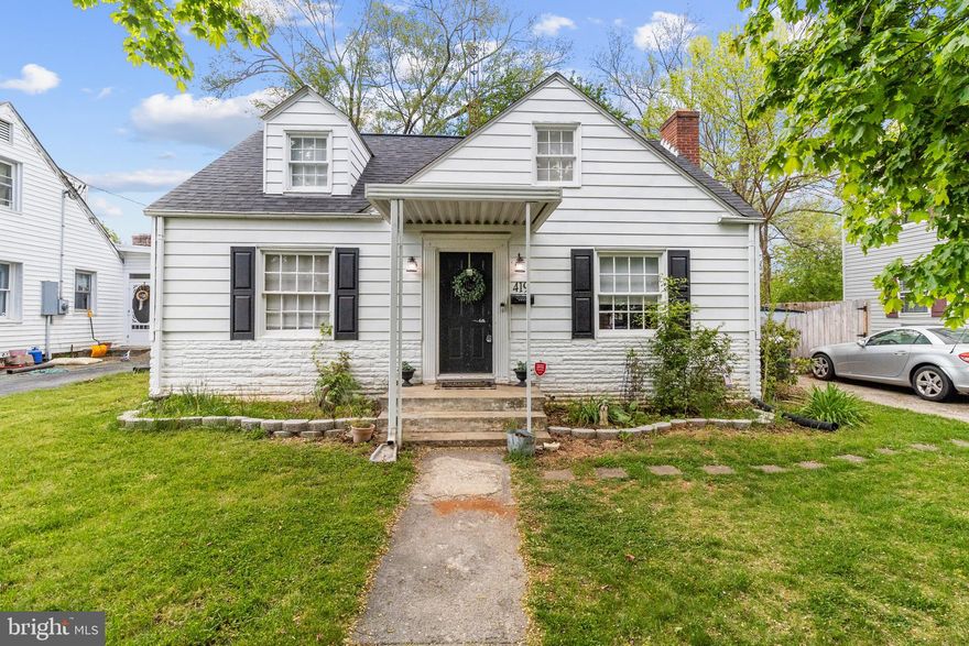 This charming cape cod is ready for it's new family.  The main level features a living room with fireplace, updated kitchen with new stainless steel appliances, a full bath, and two bedrooms.  Upstairs you will find a master suite with an added bathroom and a bonus room that could be used as a fourth bedroom.  The basement is currently used for storage and has a laundry area.  The backyard is spacious and ready for your personal touch!!  This beautiful home won't last long.  Schedule your showing today!! (Square footage is not including the two rooms upstairs the total is closed to 1000-1100 sq ft total)