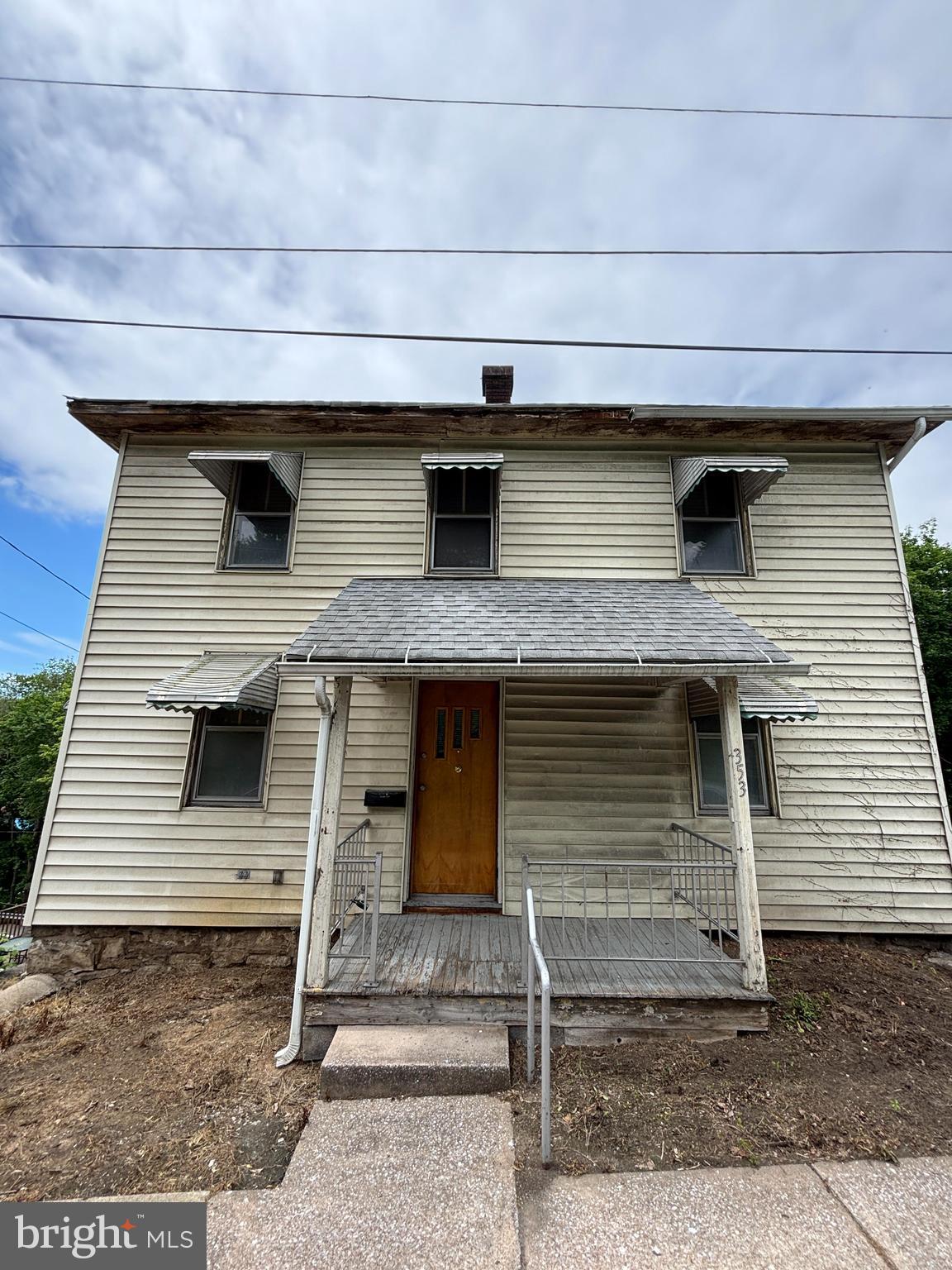 Welcome to 353 Pine Street, a rare investment opportunity located on the edge of charming Bellefonte. This unique property spans five levels, with three finished floors of living space ready for your vision and renovation expertise. The home has been cleaned out, creating a blank canvas for your custom finishes and design. The main level features space for a kitchen, living room, and bathroom. The upper level currently hosts two bedrooms and another bathroom. The lower level already has a bathroom in place and offers the potential to add additional bedrooms or flexible living areas. Bonus spaces include a walk-up attic with ample headroom and a walk-out basement, ideal for storage or a work space. Step out the back of the property and enjoy stunning views that overlook Talleyrand Park and the Historic Match Factory, offering a rare combination of privacy and scenery just minutes from downtown Bellefonte’s shops, restaurants, and local attractions. Whether you're a seasoned investor or looking for your next project, 353 Pine Street presents a one-of-a-kind opportunity to bring a piece of Bellefonte history back to life. Don't miss your chance—schedule a showing today and imagine the possibilities.