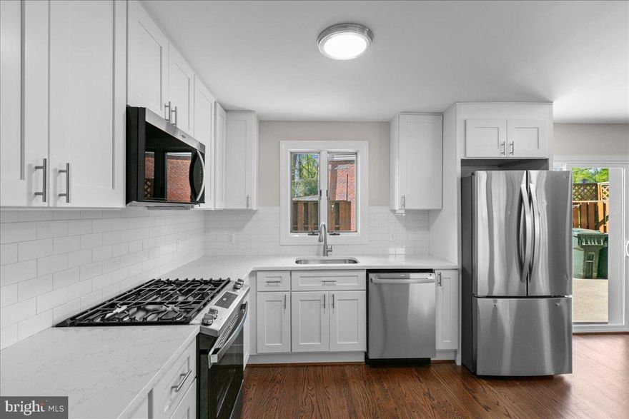 This home has been completely renovated/remodeled. Renovations include a new kitchen design along with new wood floors, counter tops, cabinets, and Appliances. Off the kitchen is a new sliding glass door leading to a large concrete patio and privacy fence. The new flooring extends into the family room addition. The wood flooring on the rest of this level has all been refinished and is absolutely gleaming. The hall bath is all completely replaced/updated. And the primary bath is also brand new and beautifully updated. The 3 bedrooms on this level are all quite large. The lower level has all new LVP, completely new full bath. Huge laundry room with tons of unfinished space for storage or a workroom. Off this lower-level family room is a very spacious screened- in porch. All of this in the Lake Braddock pyramid, and excellent access to all major commuting options including access to the 495 toll lanes, and metro bus service. and easy acess to the VRE, Restaurants & Shopping.