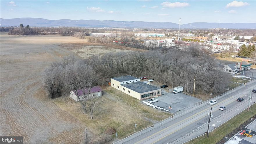 Owner is ready to retire and let the next owner thrive in this amazing commercial location! Roof is 5 years old. 2 parcels being sold together. Neighboring parcel known as 1048 Harrisburg Pike is zoned Commercial/Residential, has sewer line and boasts a 30'X50' pole barn. Just shy of 1 acre for both lots together.