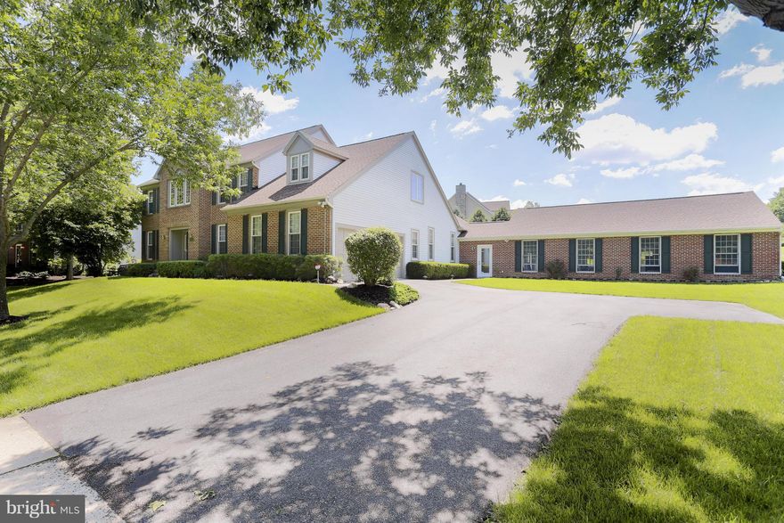 Spectacular Home with  5 1/2 ft deep  ** In-door pool ** w/full bath overlooking beautiful sunroom & landscaped lot. H/W fls on 1st level, granite counters accents the lg family size kitchen. 1 year old roof, main level HVAC 3 yrs old. Main level library with H/W. Generator for entire house (excl. pool) This home is the Jamestown Model with many added features.Rough in for full bath in LL