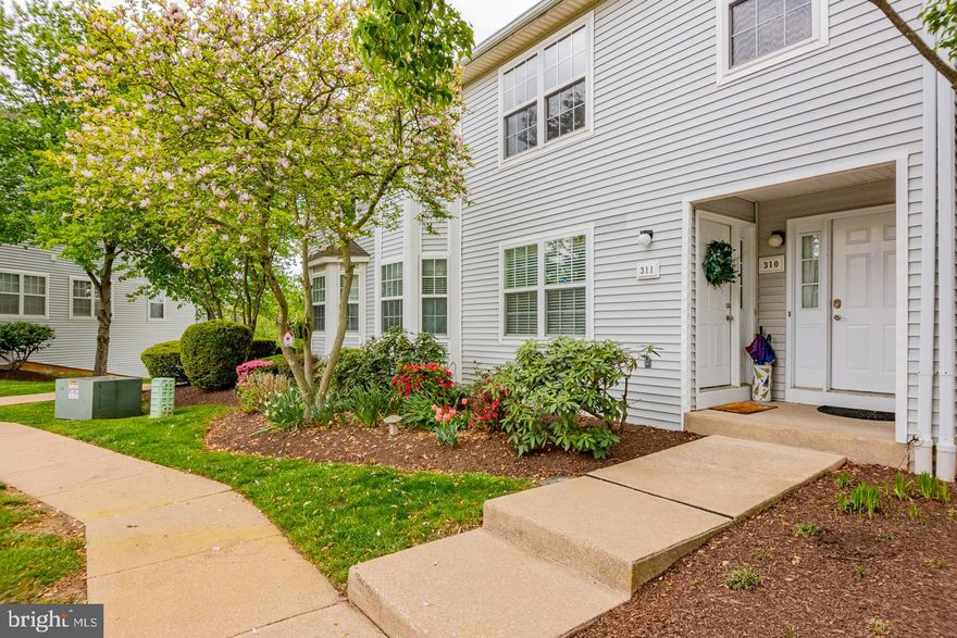 Don't miss out on 310 Huntington Court in the Exton Station community! . The main floor has a large living room with a 365 degree gas fireplace perfect for relaxing. The spacious layout offers  plenty of room to fit just about any size flat screen TV and any type of furniture in this area. The kitchen has upgraded appliances, plenty of cabinets, under-cabinet lighting, and Corian solid surface counter tops. The sunlit kitchen naturally opens out into the Living Room also located on the first floor.  hardwood laminate floor in first floor is  easy to clean and maintain. Two bedrooms and two full baths is convenient. The primary bedroom has vaulted ceilings, a walk-in closet, a ceiling fan and a deck that overlooks a beautiful landscape. The master bath has cathedral ceilings and is bright with plenty of windows. The laundry is also conveniently located on the second floor. The basement is large and mostly finished with an additional great space for storage. The basement also has a finished powder room and wet bar. The Exton Station community has a pool, 2 tennis courts, 3 playgrounds and a clubhouse all included in your monthly fee. The community is conveniently located near Main St Village, the Exton train station, Rte 100, and the Rte 30 & Rte 202 interchanges. Some pictures are virtually staged