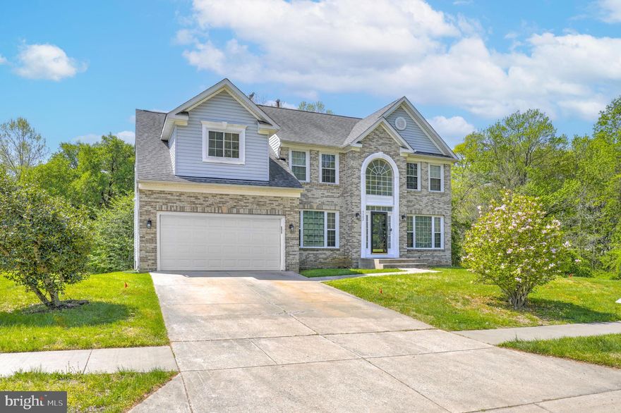 Welcome to this beautiful colonial in the sought-after Tippet Estates community, offering peaceful surroundings with no homes on one side or across the street, along with scenic tree-lined views. Tucked away yet conveniently located, this home features 4 bedrooms and 3.5 baths within a spacious and well-appointed layout. A two-story foyer creates an impressive entry, complemented by a second-story balcony overlooking the family room with a gas fireplace. The main level showcases hardwood floors, with fresh paint and new carpet throughout. The primary suite offers vaulted ceilings, a generous walk-in closet, and a private en suite bath, creating a comfortable retreat. A fully finished basement adds versatile living space ideal for entertaining, recreation, or guest accommodations. The home also presents an excellent opportunity to personalize and update to your own style. Backing to trees, the home enjoys added privacy and a serene natural setting.