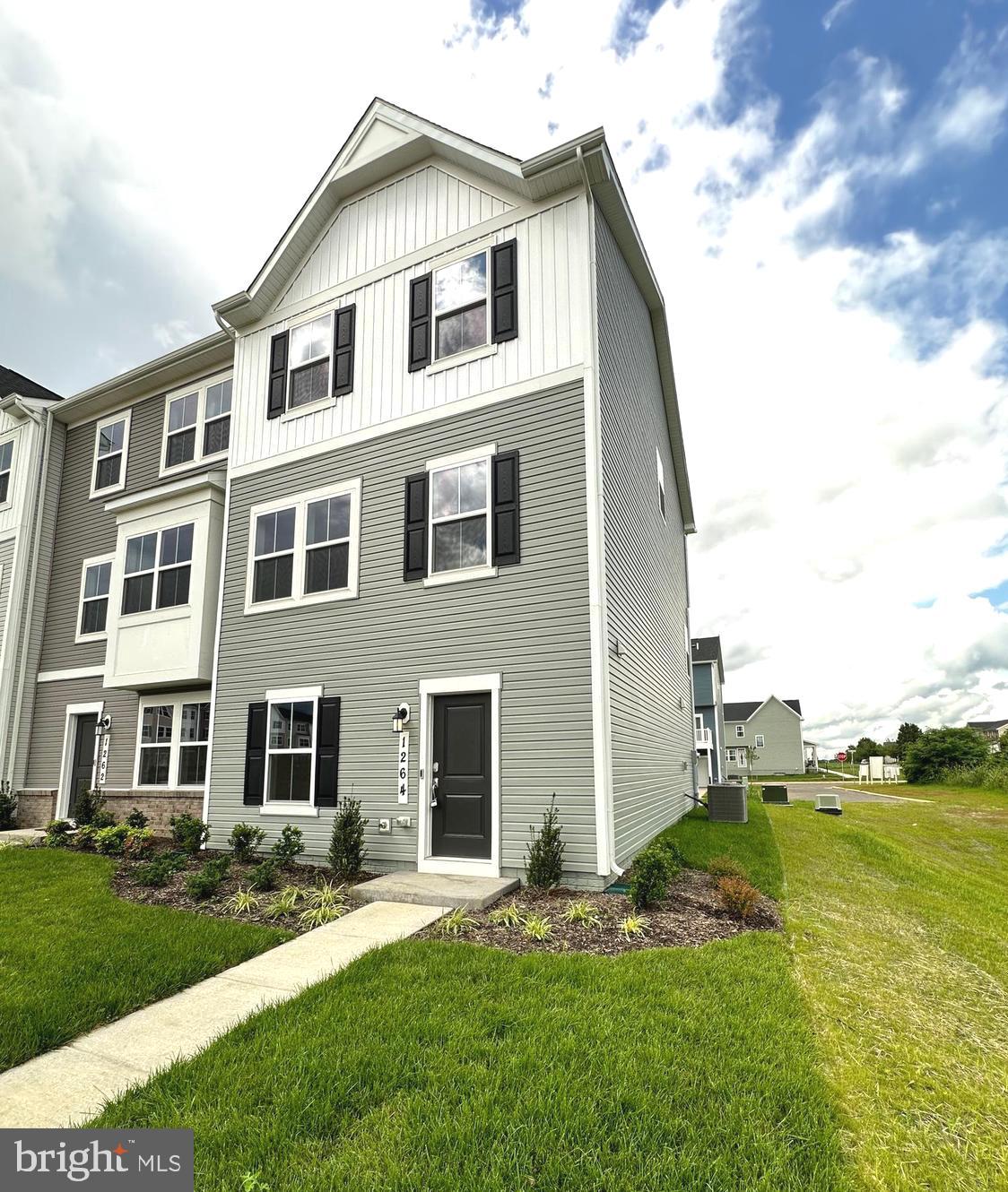 Welcome to Red Clover Meadows—a thoughtfully planned community in Ranson, WV, just minutes from historic landmarks, shopping, dining, parks, and major commuter routes. This brand-new, never-occupied end-unit Lancaster townhome offers extra privacy and natural light, featuring three bedrooms, two full baths, and two half baths across three finished levels. The entry level includes a flexible recreation room, a powder room, and a rear-load two-car garage. On the main level, enjoy an open-concept layout that seamlessly connects the Great Room, dining area, and chef-inspired kitchen with upgraded granite countertops, cabinetry, and modern appliances. Step outside to a spacious 10x18 deck—perfect for relaxing or entertaining. Upstairs, the owner’s suite boasts a private bath and walk-in closet, joined by two additional bedrooms and a full bath. For added comfort and style, the landlord will be installing window blinds. HOA fees are covered by the landlord. Small dogs and cats allowed. CALL FOR APPLICATION