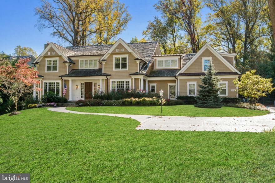 Fantastic New England style home built by Buchanan-Price & located on one of the prettiest streets in Langley Forest. Stunning & private, 1-acre lot with pool, sport court, flat yard, mature landscaping. 8,000+ sqft on 3 lvls. Bright & open floor plan with 10ft ceilings, gracious room sizes. 5BR up. 3 masonry FP.  Walk-out LL w/ theater, bar, exercise, etc.  Immaculate & meticulously maintained.