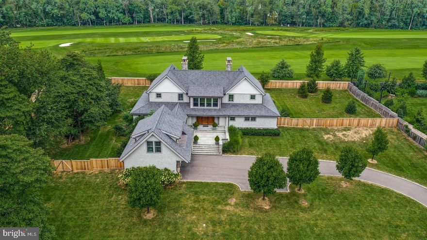 Absolute Perfection!  Nestled on one acre of pristine, private grounds abutting the Philadelphia Cricket Club's Saint Martin's golf course, this exquisite residence is a seamless blend of traditional & contemporary spaces and offers state-of-the-art highest quality finishes throughout.  Light-filled, open and airy, this ideal sized residence is better than brand new and offers an excellent floor plan for today's modern living.  Enter through the handsome mahogany front door into the foyer area with coat closets, powder room and oak flooring throughout.   The spectacular two story living room is breathtaking with a wall of windows and Kingsman two -sided gas fireplace.  The adjacent open space includes a family & dining room combination  with built-in cabinetry and wet bar.  French doors lead to a covered porch that offers a great spot for entertaining or just relaxing after a busy  day.  The ultramodern eat-in kitchen includes Poggenpohl cabinetry, marble backsplash & countertops, Wolf  range, hood & microwave drawer, Bosch dishwasher and SubZero refrigerator.   The superb design offers a built-in desk, breakfast bar and large pantry closet.  Off of the kitchen is the mud room/laundry area with Whirlpool washer & dryer, built-in bench and garden sink.  Looking for a first floor bedroom? This is as good as it gets!  This main bedroom en suite offers a bathroom with large marble steam shower, hydrosystem tub, radiant heated floor and double vanities.   Includes a customized walk-in California closet,  gas fireplace and French doors leading to an inviting covered porch.  Upstairs there is a large open space which can be used as a sitting room and/or office with spectacular views of the surrounding grounds.   On either end of the second floor, there is en suite bedroom each with a gas fireplace, marble bathroom, large closet and private balcony.  The fourth bedroom en suite is situated off of the kitchen over the garage..  If so desired this space would make an excellent in-law suite or au pair quarters.  The lower level is beautifully finished!  Includes a large open space with oak wood flooring, a recreation area,  kitchenette with Poggenpohl  cabinets, marble countertops & backsplash, SubZero refrigerator drawers & ice maker.  There is a wine cellar with Millesmine racks & tech lighting and a great place for wine tasting with friends.  You will find three large storage closets on the way to the exercise room which includes a wall of mirrors and LockTough rubber tile flooring.  Opposite the gym is a full marble bathroom.   Don't miss the movie theater with screen, projector and World Wide Stereo equipment included.  There is a utility/storage room on either side of the lower level and an exit to the outside.  The attractive exterior includes Maibec 200 cedar shingles, step lighting, Hubberton Forge sconces,  an attached two car garage with a courtyard offering plenty of additional parking.   Includes privacy fencing around the side & rear yards.  City of Philadelphia Tax Abatement in place until 10/2028.   While this premier location is quiet and secluded, it is so convenient to the quaint shops & many eateries along Germantown Avenue plus all the other numerous amenities the village of Chestnut Hill offers.  Enjoy the proximity of the Wissahickon Valley with hiking and horseback riding trails just footsteps away from your front door.  Walk to the local train lines for a quick ride into Center City or connect with Amtrak for a stress free commute to NYC.   Experience the perfect combination of cosmopolitan and suburban living  right here in the city!  Hurry and schedule your private showing today.