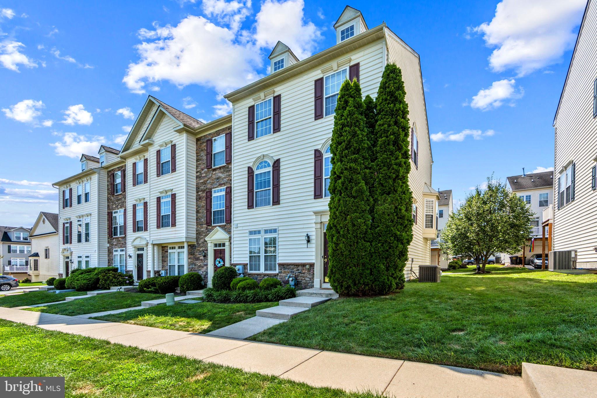 Welcome to 2404 Northridge Court, an exceptionally well maintained end-unit townhome tucked directly on the expansive courtyard green space in one of Phoenixville’s most sought-after communities. From the moment you arrive, this home stands out, not just for its premier location within Northridge Village, but for the lifestyle it offers: bright, stylish, and with direct access to the Schuylkill Trail, steps from everything. Step inside and you’re greeted by a spacious entryway and a beautifully finished bonus room that’s perfect as a home office, guest space, or second living area. The ground floor also features interior garage access, laundry, and an additional storage space. Head upstairs and the heart of the home unfolds into a light-filled open floor plan where natural sunlight pours in from sunrise to sunset. The main level blends comfort and function seamlessly, with a spacious living room, dining area, and upgraded kitchen that’s ready to impress. Highlights include sleek countertops, modern appliances, ample cabinetry, a generous pantry, and a large island with built-in sink and additional storage, ideal for both everyday meals and entertaining guests. Step outside from the kitchen to your recently upgraded second-story deck (2022), which was then reinforced with a new support beam in 2025, offering a sunny space to relax or dine al fresco. The natural light pours into the oversized windows filling the kitchen and living room with plenty of light from dawn until dusk, when you can cozy up with the gas fireplace. New pet proof carpet has also been installed to keep the space both comfortable but also easy to maintain. The upper level features three generously sized bedrooms and two full bathrooms. The primary suite is a calming retreat, complete with a walk-in closet and private en-suite bath. The two additional bedrooms offer great closet space and share access to the home’s second full bathroom. This home has been thoughtfully updated for peace of mind and comfort, including a brand-new water heater (2023), upgraded HVAC system (2021), new basement flooring and baseboards (2020–2022), and a fireplace fan for cozy winter evenings. Outside, enjoy all the benefits of courtyard living with a lush green space just steps from your door and direct access to the Schuylkill River Trail, which connects you to downtown Phoenixville in minutes. Walk or bike to coffee shops, breweries, farmers markets, and all the energy of Bridge Street without ever getting in your car. With pet-proof carpeting, updated systems, and one of the best locations in the neighborhood, 2404 Northridge Court offers an unbeatable blend of charm, convenience, and modern living.