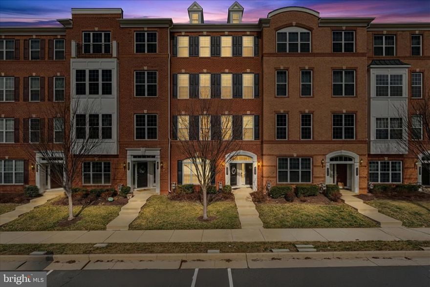 Welcome to this beautifully upgraded 2,452 sq ft upper-level, townhome-style condo in the highly sought-after Buckingham at Loudoun Valley community in Ashburn. Built in 2018, this stunning Denham model blends modern luxury with low-maintenance living and is filled with natural light, tall ceilings, and designer finishes throughout. Freshly painted, the home welcomes you with a private entry and hardwood stairs leading to a bright, open-concept main level featuring wide plank hardwood flooring, a soft neutral palette, and a seamless flow between the living, dining, and kitchen areas. The gourmet kitchen is a true showpiece, offering 42” white cabinetry, quartz countertops, a stylish tile backsplash, stainless steel appliances, and a large center island ideal for entertaining, along with a sunny breakfast nook and access to a private balcony.

Upstairs, the expansive primary suite serves as a relaxing retreat with a tray ceiling, private balcony, oversized walk-in closet, and a spa-inspired en-suite bath complete with a soaking tub, sleek vanity, and frameless glass walk-in shower. Two additional spacious bedrooms share a beautifully updated hall bathroom, while the upper-level laundry room adds everyday convenience. Additional highlights include smart home features such as smart locks, switches, and an Ecobee thermostat, designer lighting and chandeliers, and a freshly painted one-car rear-load garage with a private driveway and ample guest parking.

Residents enjoy a low HOA and access to resort-style amenities including three community centers with pools, gyms, and parks, as well as walking and biking trails, lawn maintenance, snow removal, and trash and recycling services. The location is unbeatable, with easy access to the Ashburn Silver Line Metro, Dulles Greenway, and Routes 50, 7, and 28, and just minutes from Brambleton Town Center, shopping, dining, parks, and top-tier community amenities. This move-in ready home truly shows like a model and offers the perfect combination of space, style, and convenience—an exceptional opportunity in one of Ashburn’s most desirable communities.