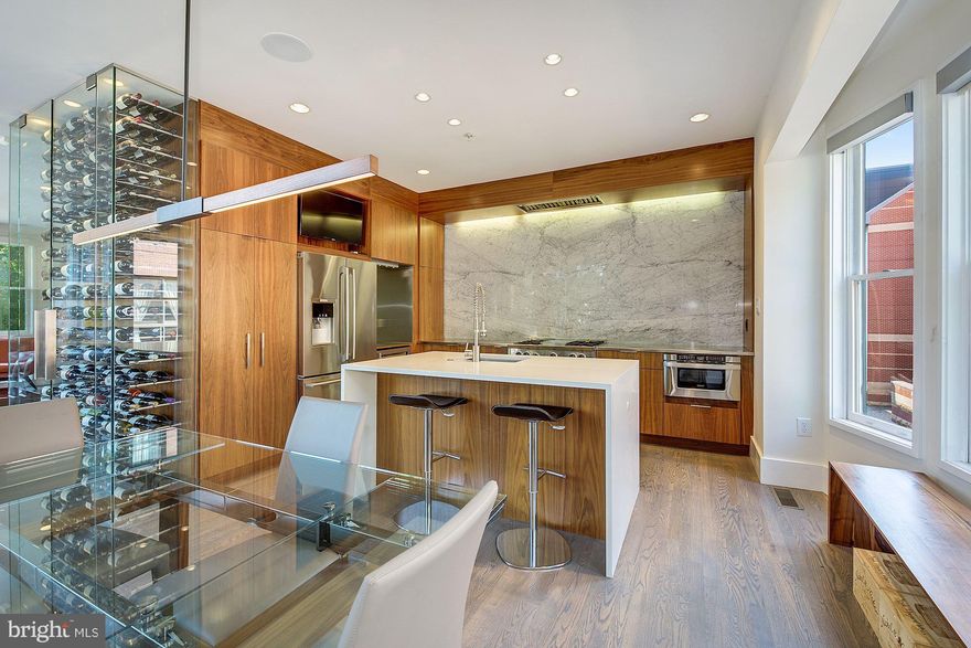 LIKE NOTHING ELSE AT THE BROMPTONS! One of the sexiest townhouses in Arlington! Completely renovated by Sagatov Builders from top to bottom in 2013 to be a complete show stopper. Gorgeous Kitchen & Glass Wine Closet. 3 Bedrooms + Office, 2.5 Baths. Glass partitions & stunning design aspects throughout. 2-Car Garage. Highly Sought After & Convenient Courthouse Location - Only moments to DC.