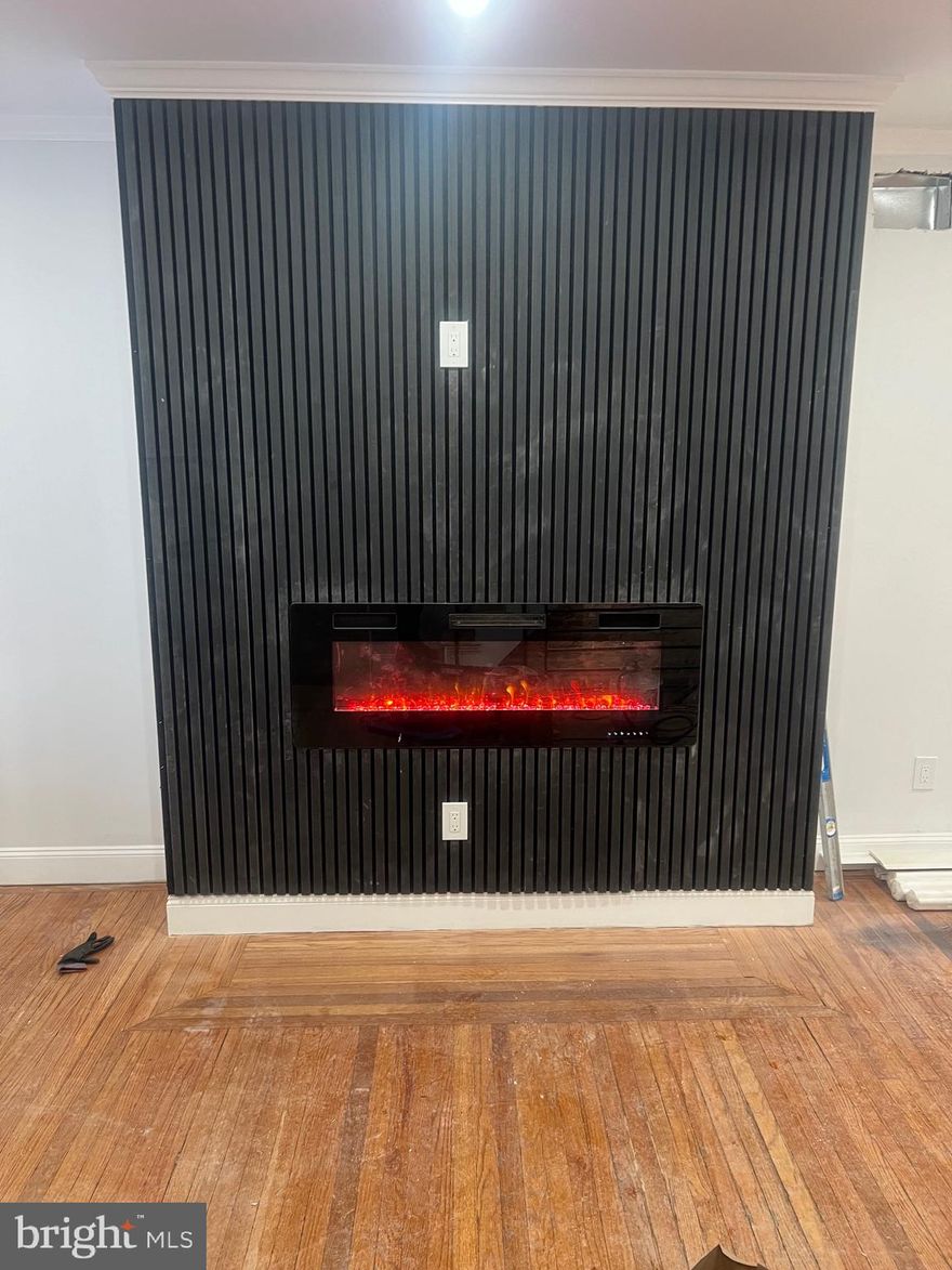 PROFESSIONAL PHOTOS ARE FORTHCOMING. 

Aesthetics. Character. Trendsetting features. Are you ready to fall in love with your new home? Allow me to introduce you to 1920 Medary Avenue. A West Oak Lane rowhome nestled in the center of the street. This beauty is laced with original hardwood floors (refinished with perfection), black paneled walls, black and gold sconces, a gourmet kitchen with a peninsula, stainless steel appliances, a second-floor laundry area, exposed brick, a finished basement with the fourth bedroom nestled in the rear, central air, a closed-in porch and much more. The beauty of this home is found in the second-floor hallway bathroom. The porcelain soaker tub features a personalized gold handheld shower wand, barn doors and a skylight. With close proximity to public transportation, expressways and major highways, your new home awaits your presence. Obtain your preapproval and submit your offer. Your keys are waiting for you!