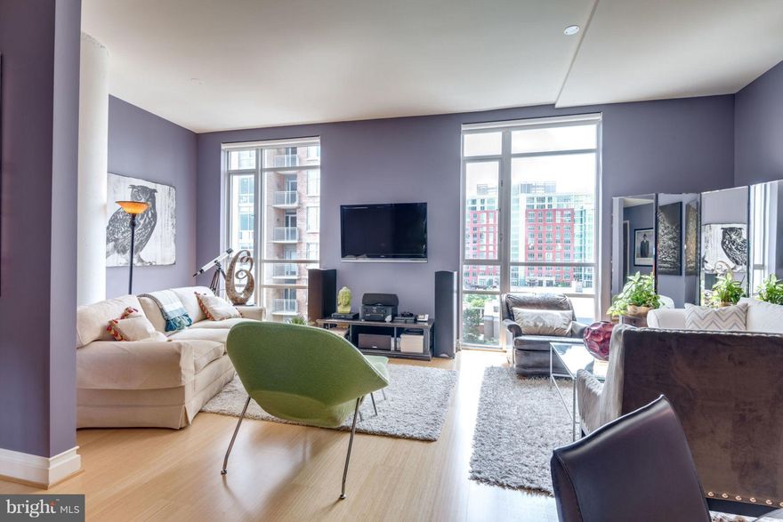 Best kept secret in RestonTown Center - Midtown North -Condo living.  Building and unit meticulously cared for.  Spacious ( 1,184 sq.ft) Contemporary Unit.   Soaring  11 ft. Ceilings, Curved Columns & Floor to Ceiling Windows provide Natural Light and give a feel of a New York Style Loft. Open Floor Plan w/ additional space/den, Gourmet Kitchen boasts Italian Cabinetry, Bamboo Hardwood Flooring, new Washer & Dryer, Secure Parking &Storage.  Unit located on a Semi-private floor with no one living above you, 1 Parking Space, Water, Gas and Trash included in rental fee.   Concierge, Gym, Roof Deck, Lounge TV Room available for use.  Walk to all Reston Town Center has to offer. Metro 1.5 miles.  Additional parking space is available and negotiable.