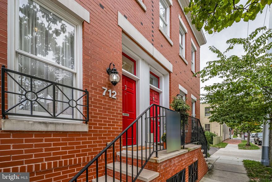 Space! Lots of space! This modern Old Town Alexandria home in an amazing location, offers 4 levels of bright, spacious rooms. Walk through the foyer to an elegant living room with firepace and built-ins open to the dining room for fantastic entertaining. The recently updated white kitchen features high end appliances, huge center island, quartz countertops and breakfast area that opens to a deck overlooking the fully fenced private outdoor space with garden. The owner's suite spans the entire first upper level with a huge walk-in closet and bathroom with soaking tub, shower and double vanity. The second upper level has 3 bedrooms with 2 additional full bathrooms. The expansive lower level offers family room, kitchenette, storage, large sun-filled windows, walk out and an additional bedroom. Wow guests on the roof top terrace with a  views of the Potomac River and Old Town and occasional fireworks. Home has 2 assigned parking spaces. Space for elevator installation if needed. Have you caught on to the latest rage, pickleball? Neighbors have created a court almost in your backyard. Not your thing, then head out your front door and enjoy the amazing shops and restaurants along Washington and King Streets. Location is a commuter's dream with close proximity to Hwy 495, Hwy 395, George Washington Parkway Reagan International Airport, Metro and Amazon HQ2! You definitely want to come and see this fantastic home!