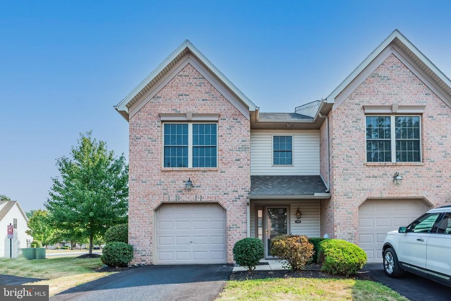 Welcome Home to this well-maintained end-unit condo offering a bright, open floor plan and design!  Engineered flooring graces the entrance, Living and Dining areas. Generously sized Kitchen with pantry and an expansive breakfast bar providing abundant counterspace. Crown molding and chair rail accents in Living and Dining areas. The two-story entry leads to the upper floor creating a welcoming layout for the three bedrooms, hall bath, and convenient second-floor laundry. Walk-in closet and vaulted ceiling in the primary bedroom suite, complete the open feel living. A concrete patio just off the Dining area is the perfect place to relax or entertain. This lovely home is located in Melbourne Place, just off Route 15 with convenient access to all major highways. Nearby shopping centers are anchored with grocery stores, banks, and restaurants. Truly a great place to call home!