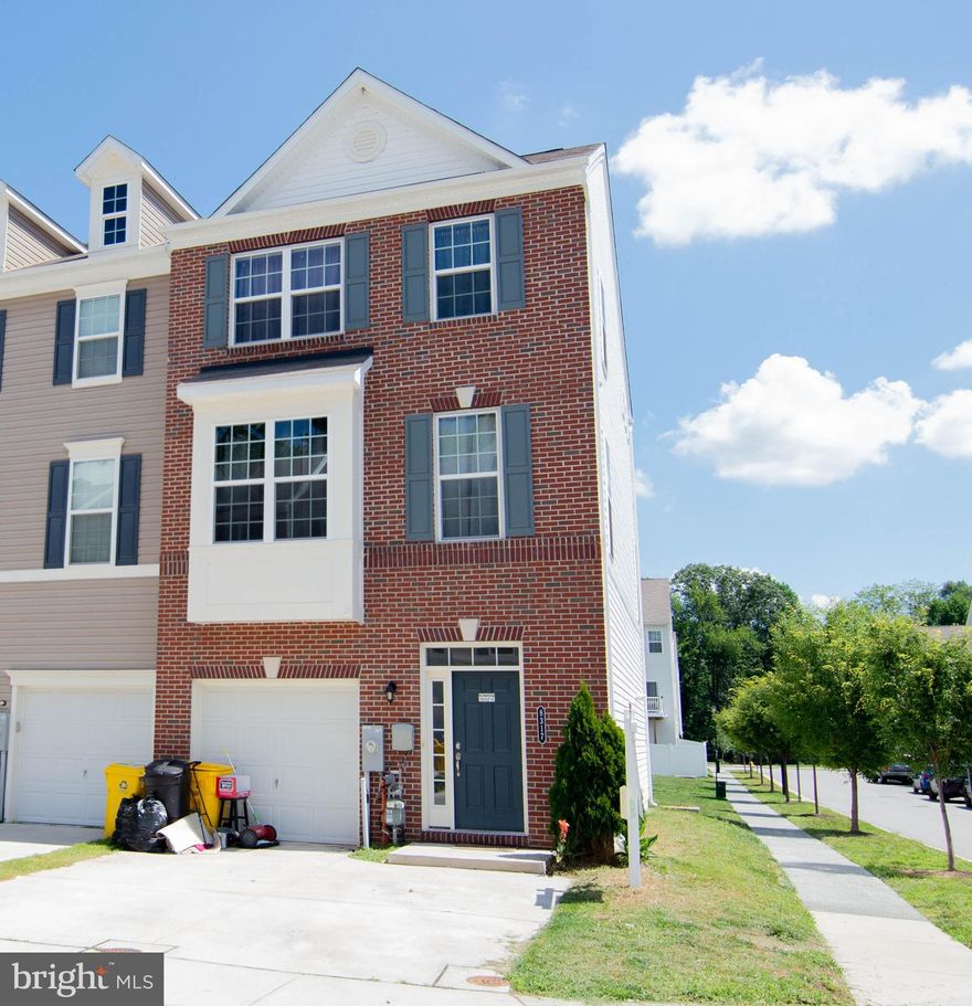 Beautiful End of Group Town home, Entry and main level hard wood floors,  First floor Bedroom and Bath.  Stainless steel appliances and granite counters, 2 large walk in closets in master suite.  Yard backs up to community play area.  Conveniently located to NSA, DISA and Fort Meade.