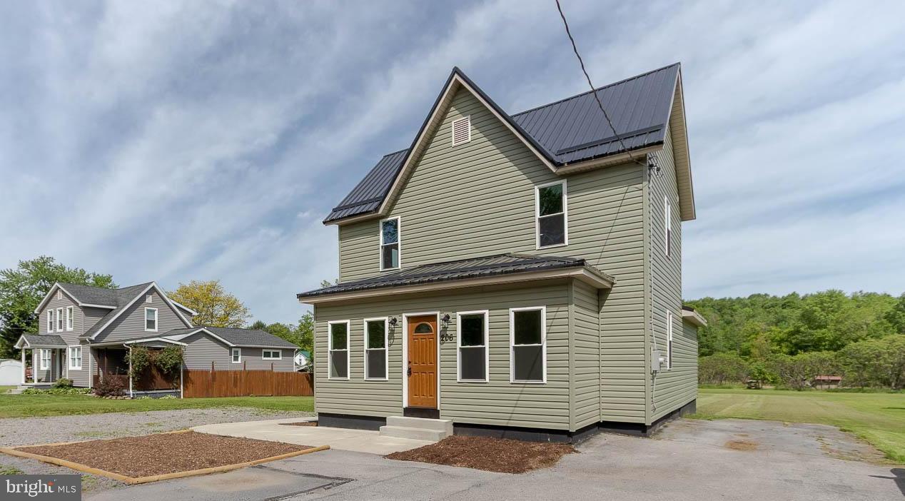 Totally Renovated & Move-In Ready! This stunning 3-bedroom, 2.5-bath home has been thoughtfully updated from top to bottom and is just waiting for you to move in and make it yours. Your “Aha!” moment starts the second you step into the inviting, heated front mudroom , the perfect space to kick off your shoes and feel right at home.
A classic 6-panel door opens into a spacious living room with durable luxury vinyl plank flooring and plenty of room to relax or entertain. Beautiful double glass doors lead you to a charming farmhouse-style kitchen, complete with ample counter and cabinet space, two pantries, and a breakfast bar for casual dining or hosting guests. The eat-in area flows easily to a cozy, covered side deck, ideal for enjoying warm summer evenings.
The first floor also includes a convenient laundry/storage area and a half bath. Upstairs, you’ll find fresh carpeting throughout, a generous primary suite with a walk-in closet and full private bath, plus two additional bedrooms and another full bath. The large attic offers excellent storage potential.
Situated on just under a half-acre, this home offers peace of mind with a new roof, new furnace, new windows, new 200 amp electrical service, and all-new interior doors. Stylish, spacious, and turn-key — don’t miss your chance to call this beautifully renovated property your new home!