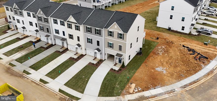 **Brand New** Available Immediately**  Over 1900 square feet of LUXURY!  Be the first to live in this gorgeous KHovnanian 3 Level End Unit Garage townhome! 3 bedroom, 3 1/2 baths.  Solid surface counters, Stainless Steel Appliances.  Custom blinds throughout.  Super close to commuter routes to Martinsburg, Hagerstown, Winchester, and Northern VA.  Pets allowed on case by case basis.